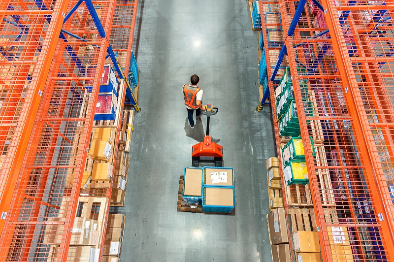 High angle view of Male warehouse worker.